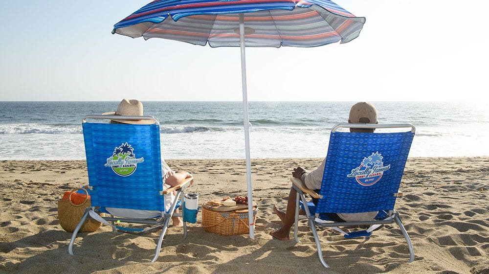 Tommy Bahama beach chairs in use at the beach